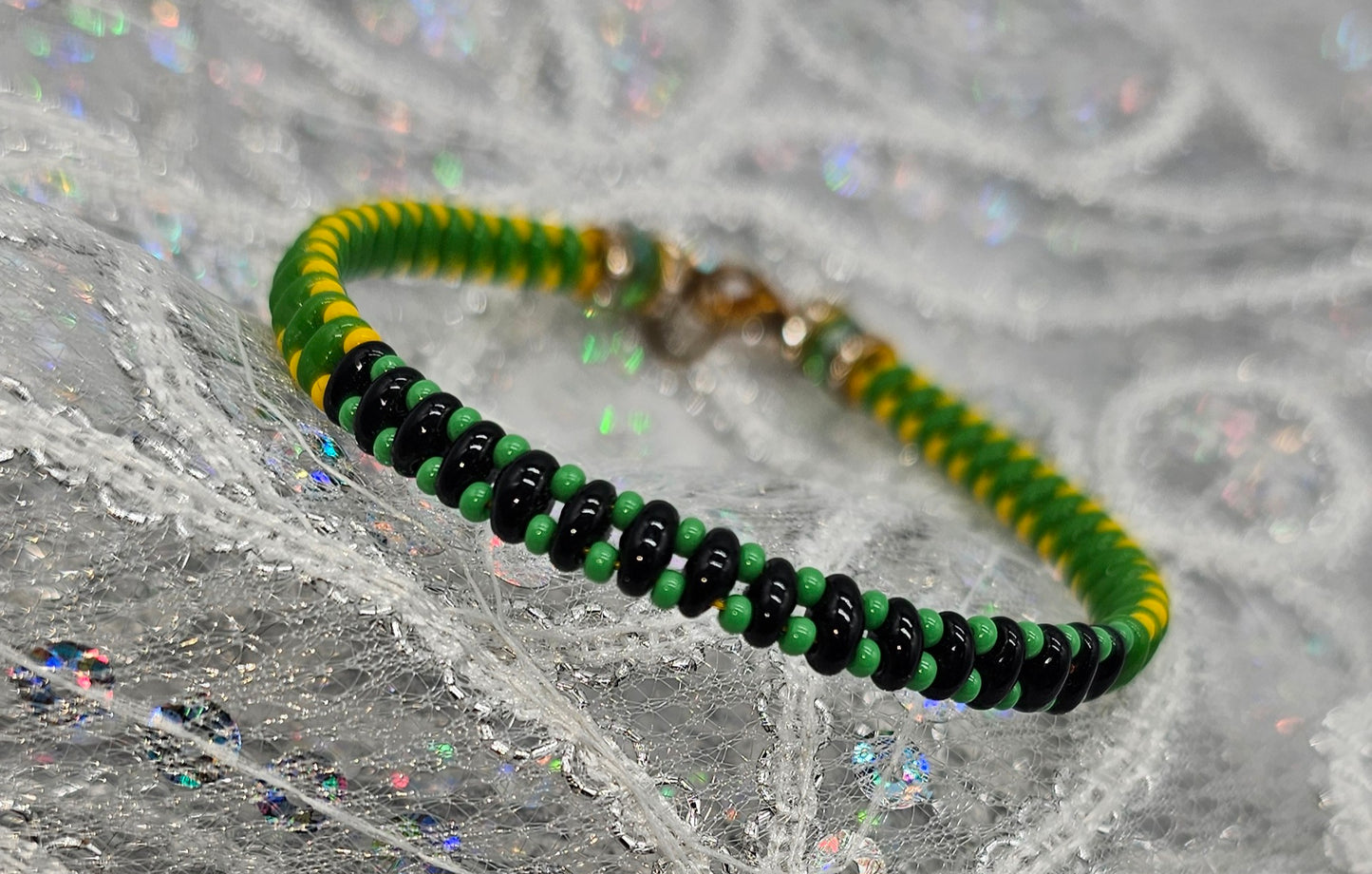 IDE DE ORULA CON OGGUN TEJIDO