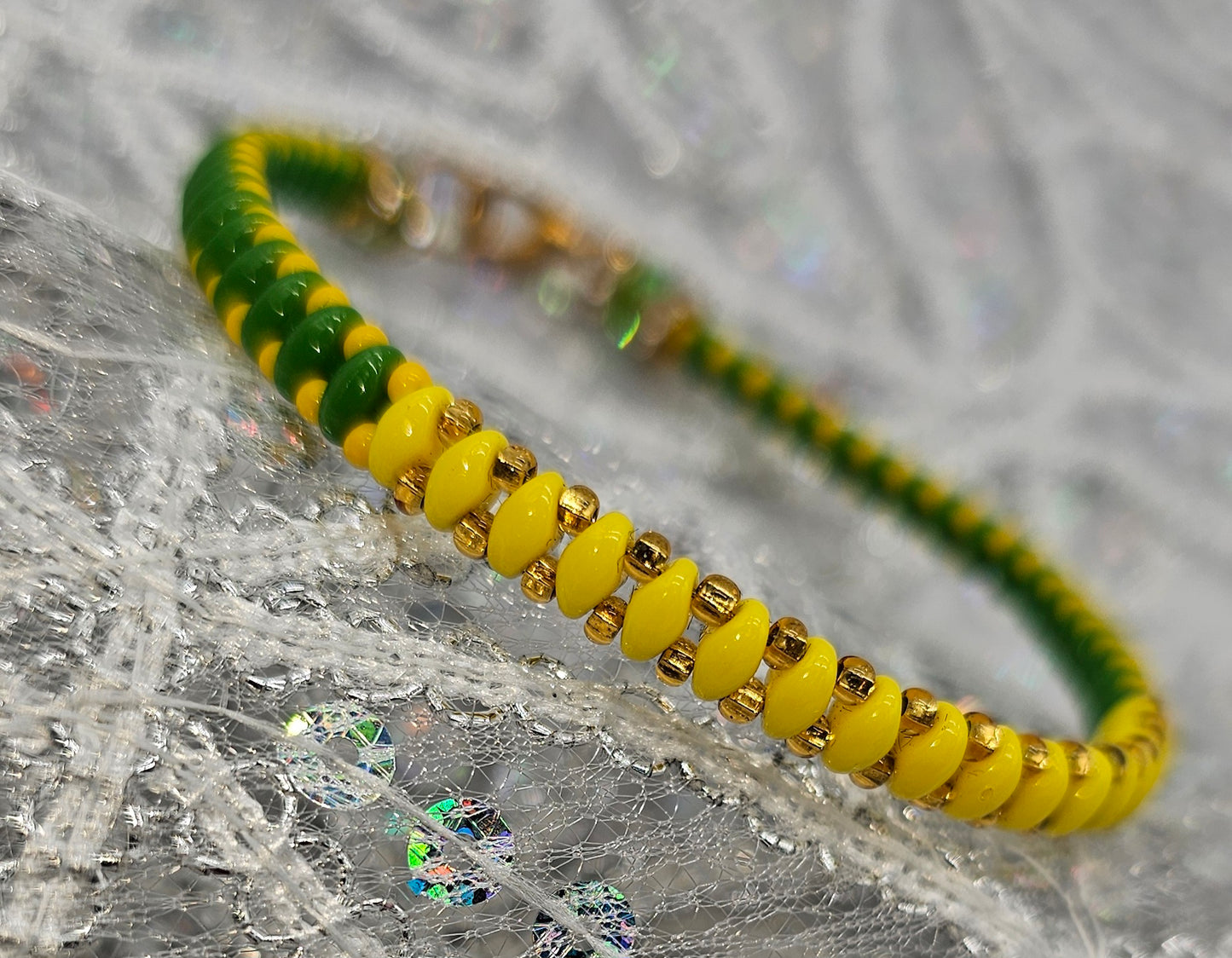 IDE DE ORULA CON OSHUN TEJIDO