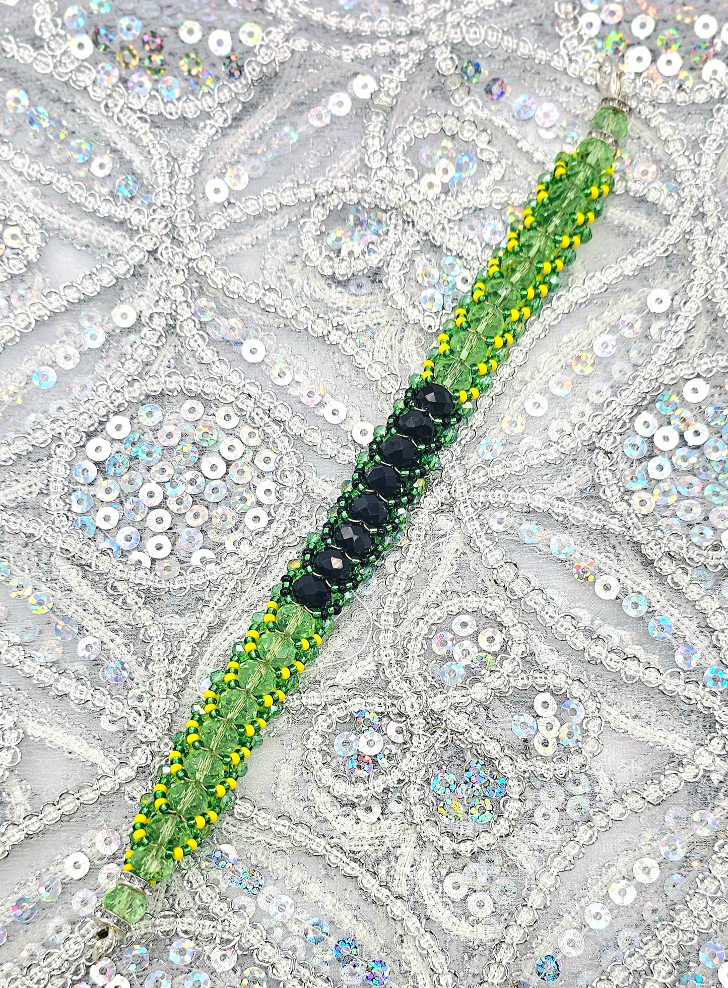 IDE DE ORULA CON OSHUN TEJIDO