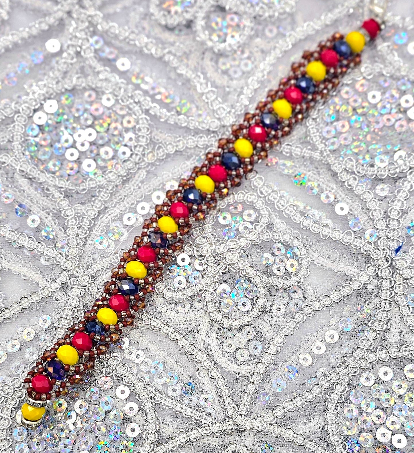 IDE DE ORULA CON OSHUN TEJIDO